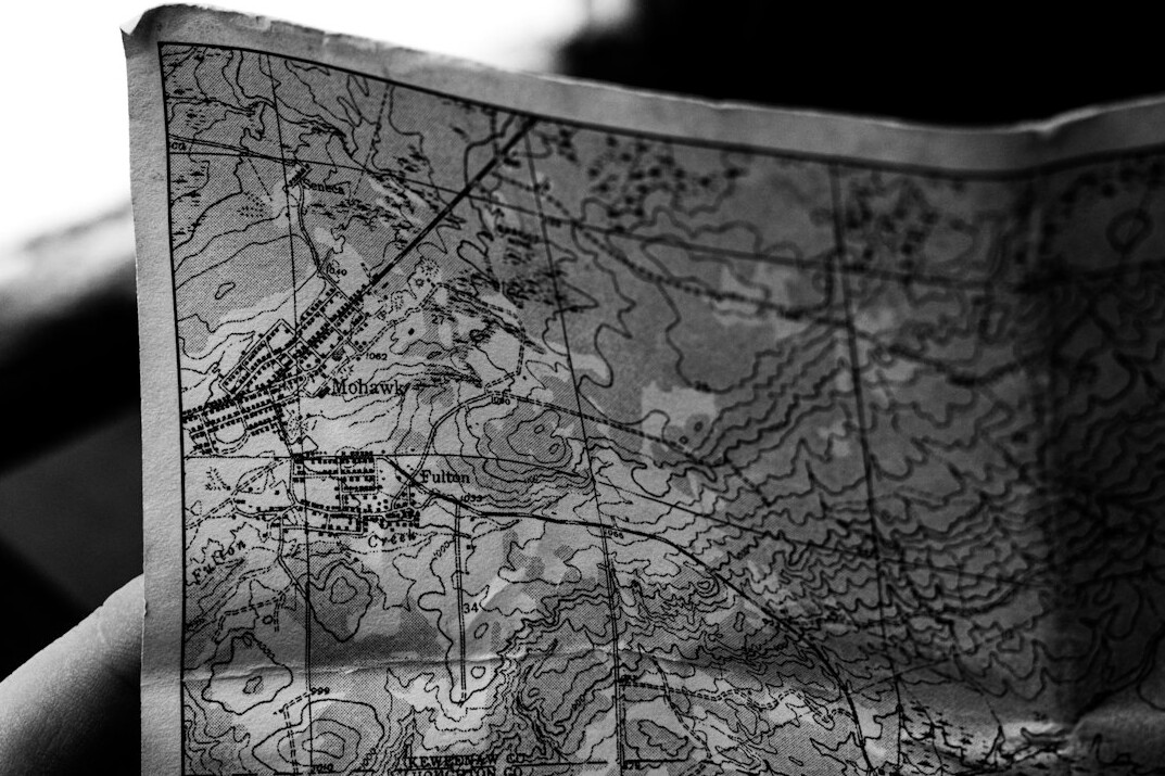 Magnifying glass over an old map
