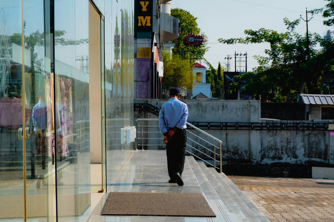 store detective watching crowd