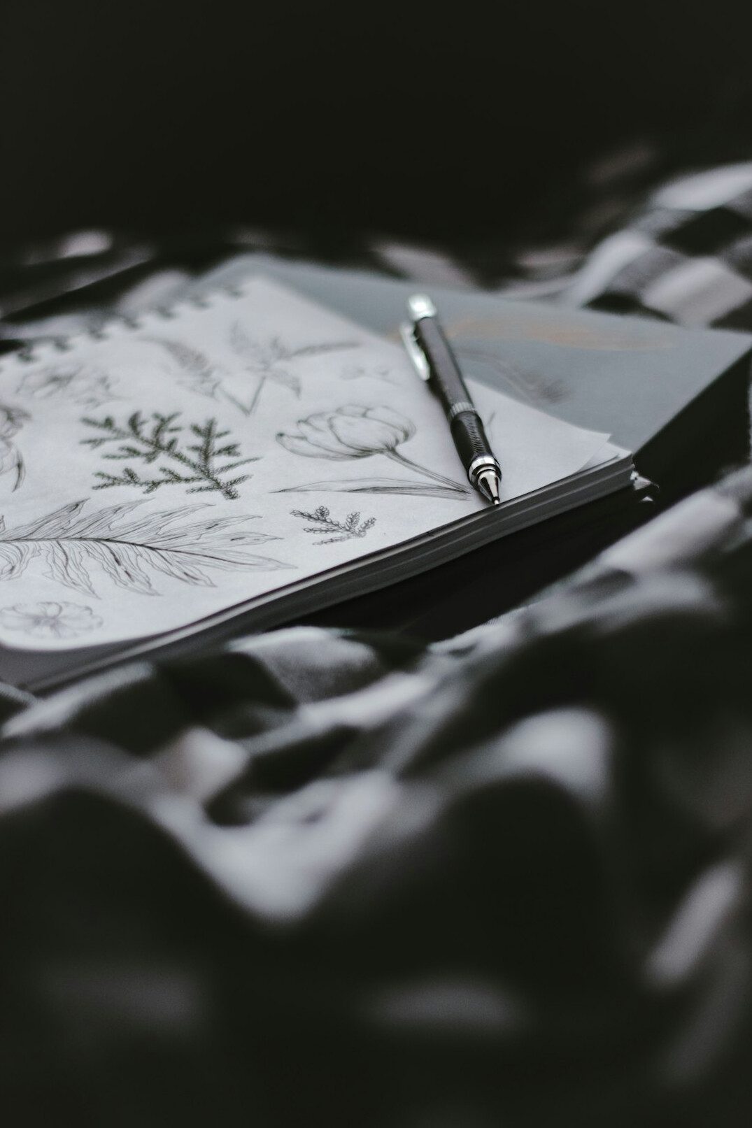 Open notebook with a pen for creative writing