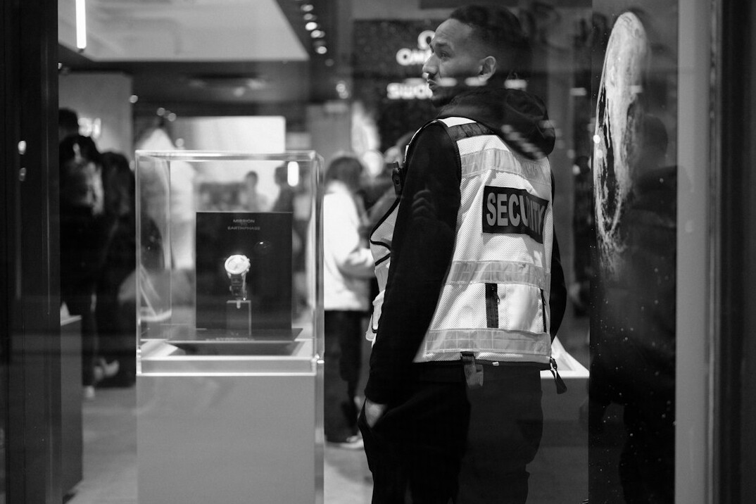 store manager with security guard